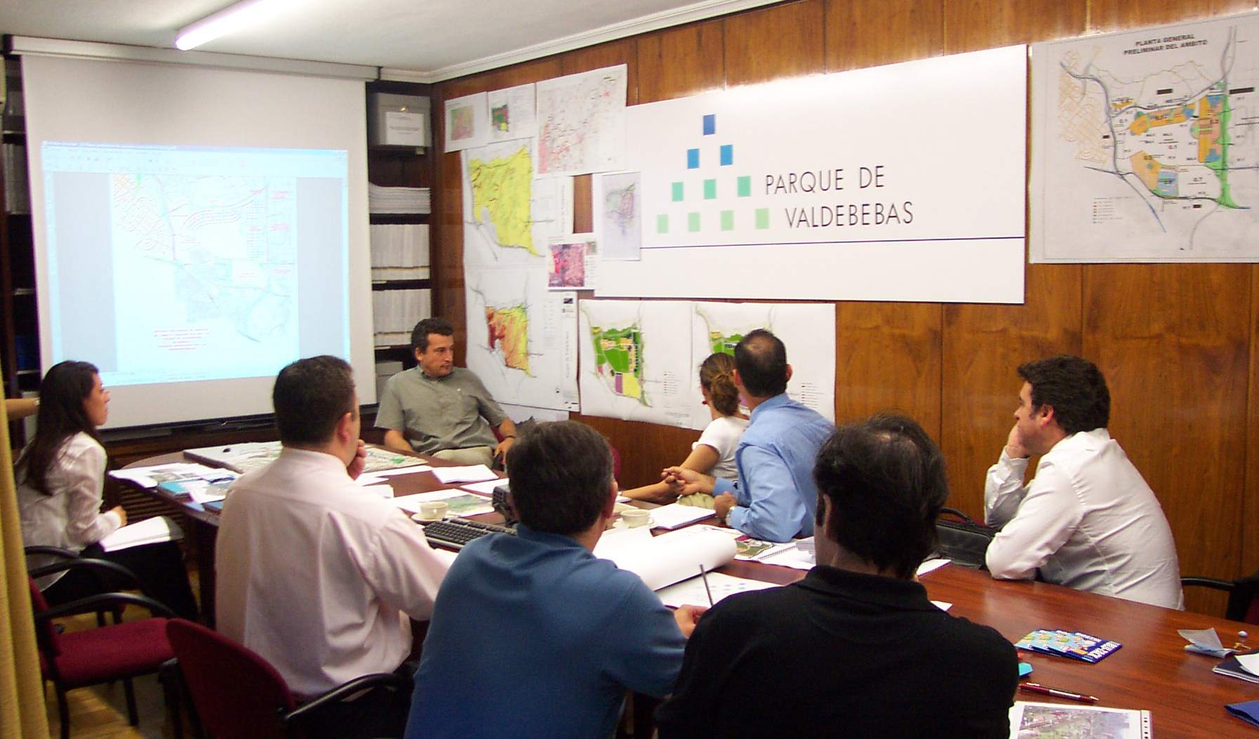 A group of people sitting around a table.