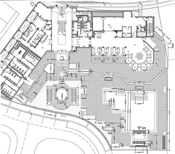 A black and white image of an aerial view of a building.