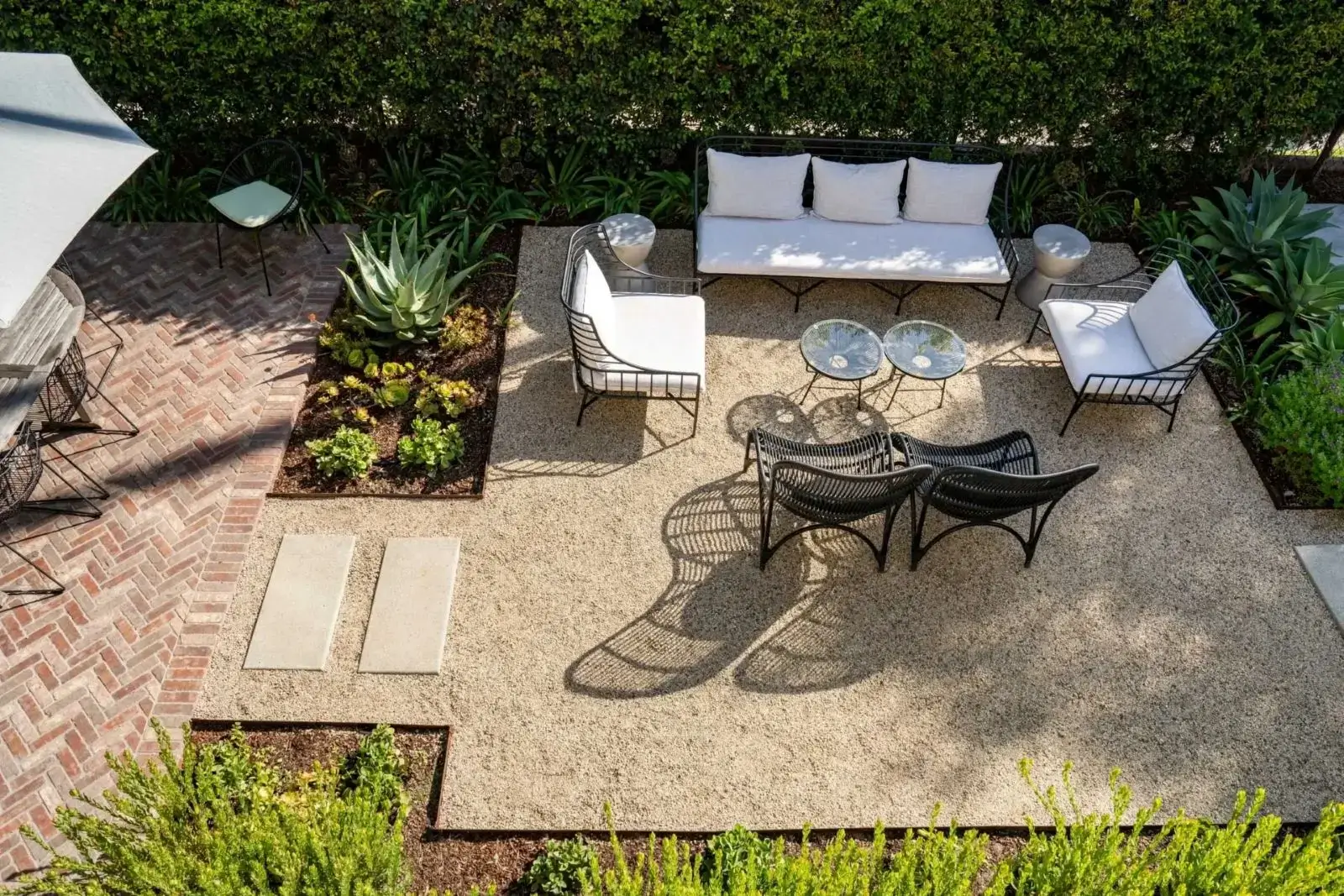 Outdoor patio with seating and tables.